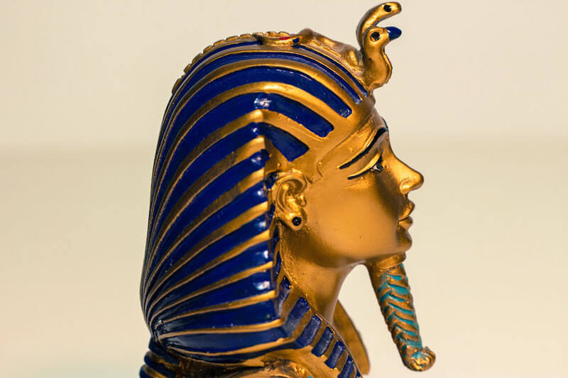 profile view of pharaoh death mask 