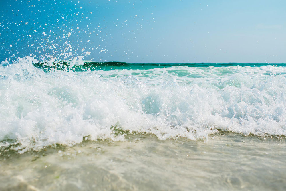 waves crashing on the beach