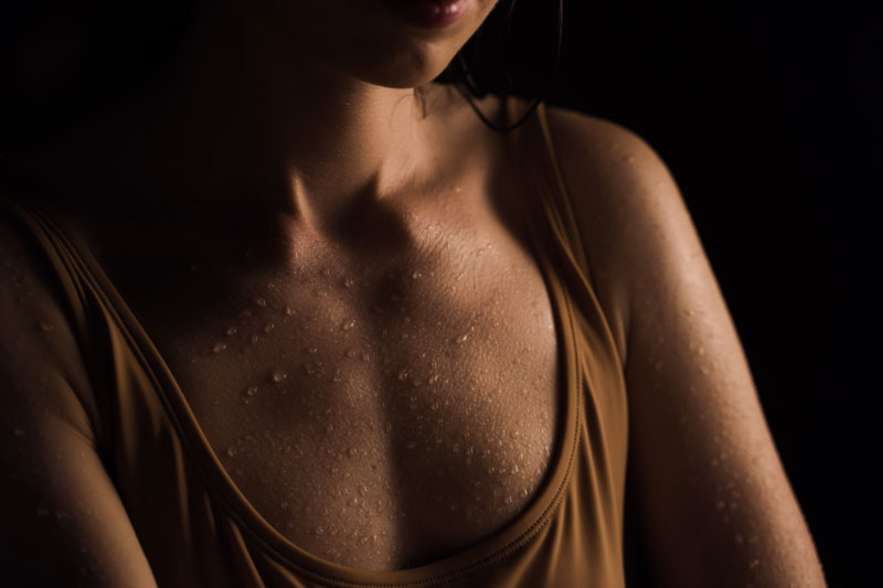 Woman's torso sweating