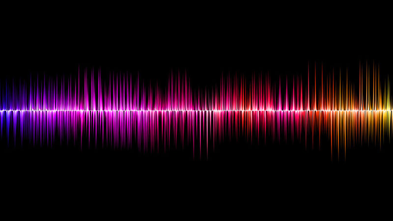 colorful sound waves against a black background